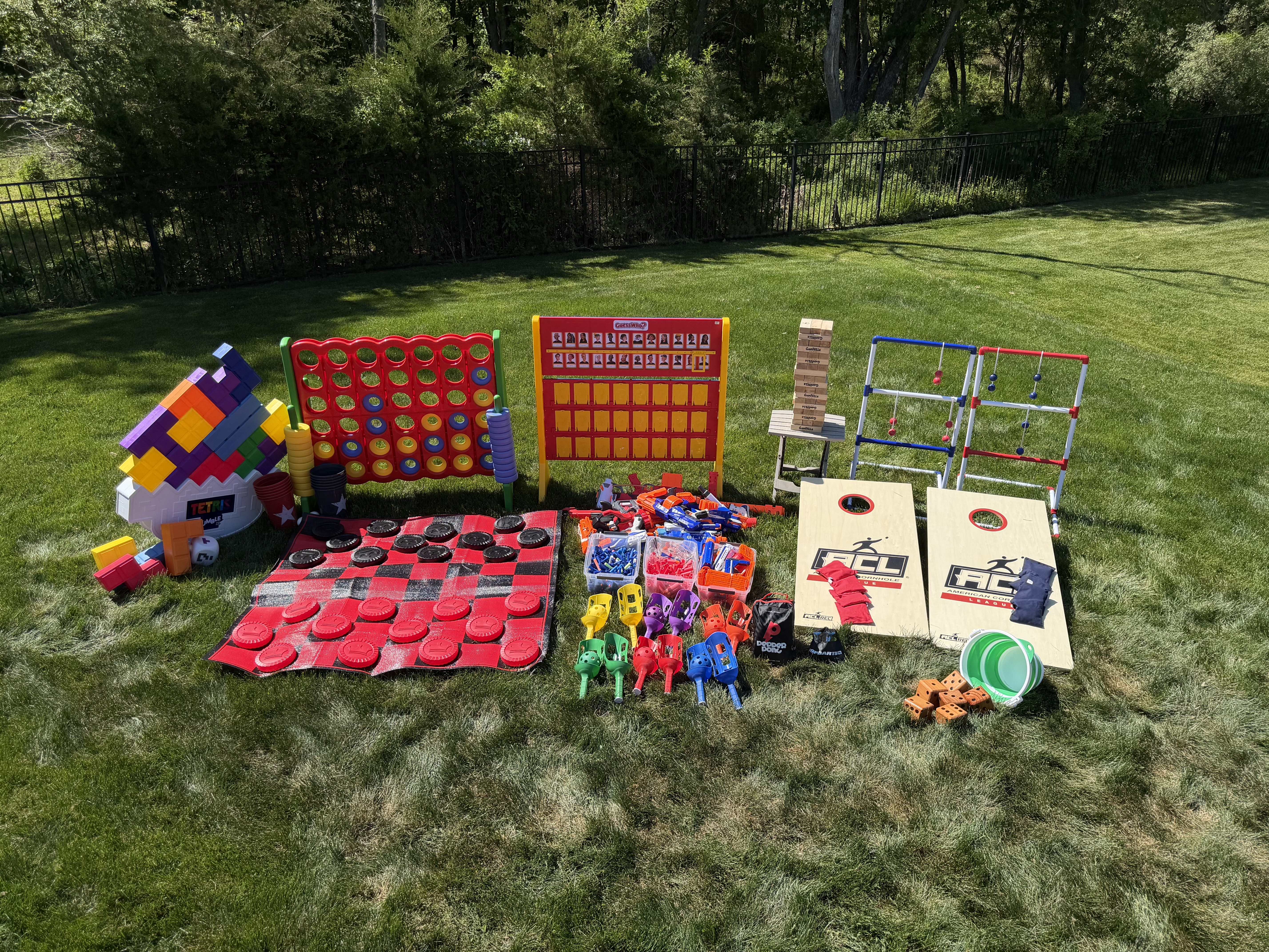 Backyard Bash rental games set up on a lawn